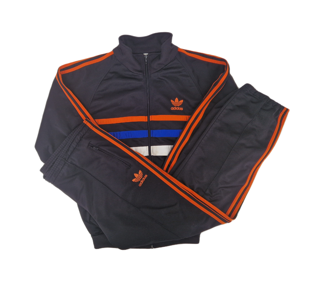 Adidas first tracksuit hot sale
