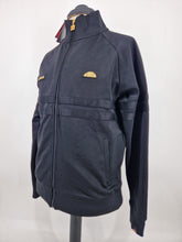 Load image into Gallery viewer, BNWT Ellesse Rimini Track Top Black Gold L
