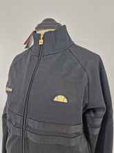 Load image into Gallery viewer, BNWT Ellesse Rimini Track Top Black Gold L
